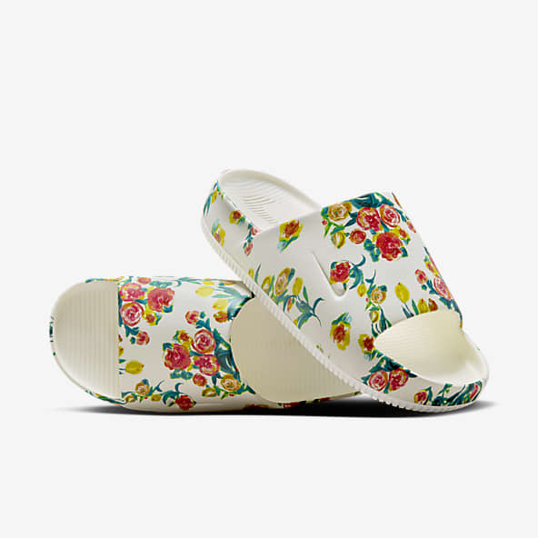 Nike slippers floral clearance